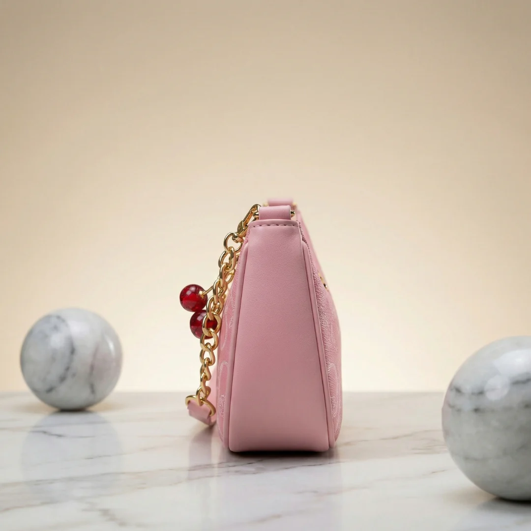 Chic Pink Coach Handbag with Cherry Charms 3