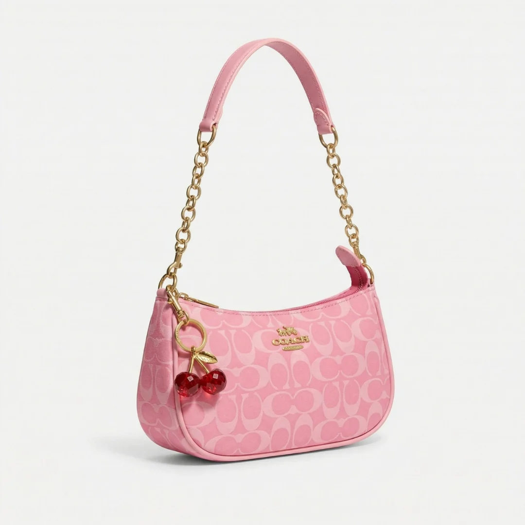 Chic Pink Coach Handbag with Cherry Charms