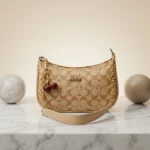 Coach Beige Monogram Shoulder Bag with Cherry Charms - Image 2